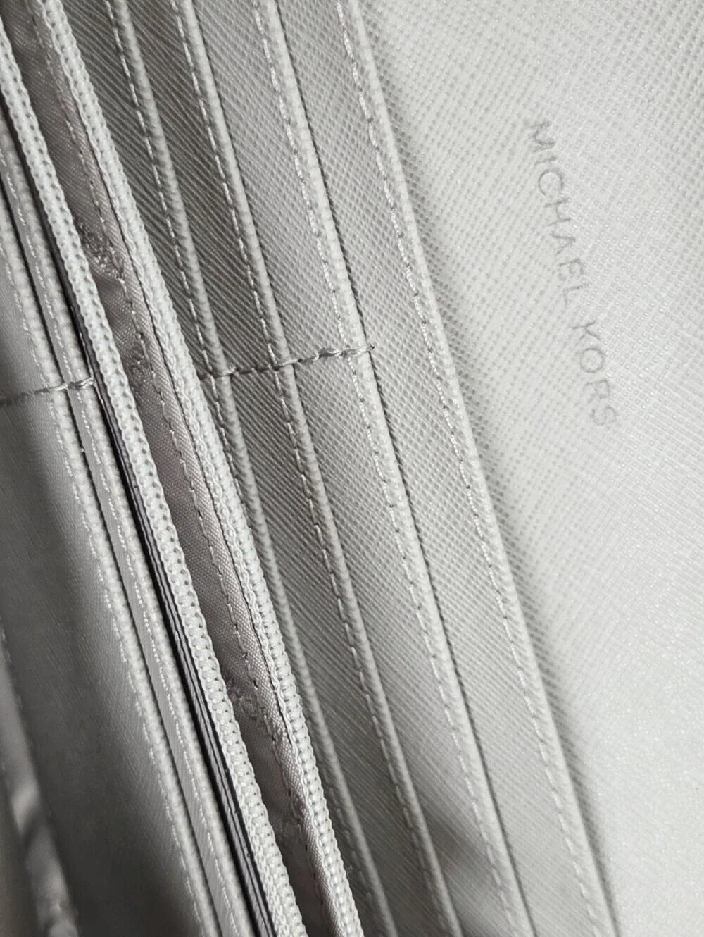 Michael Kors Pebbled Leather Wallet in Light Gray with Silver Logo